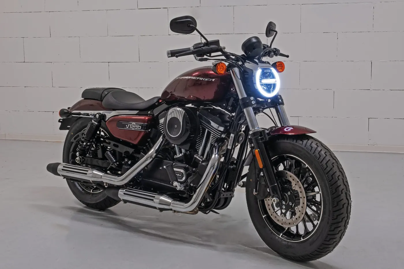 SWM cruiser motorcycle photographed in a studio